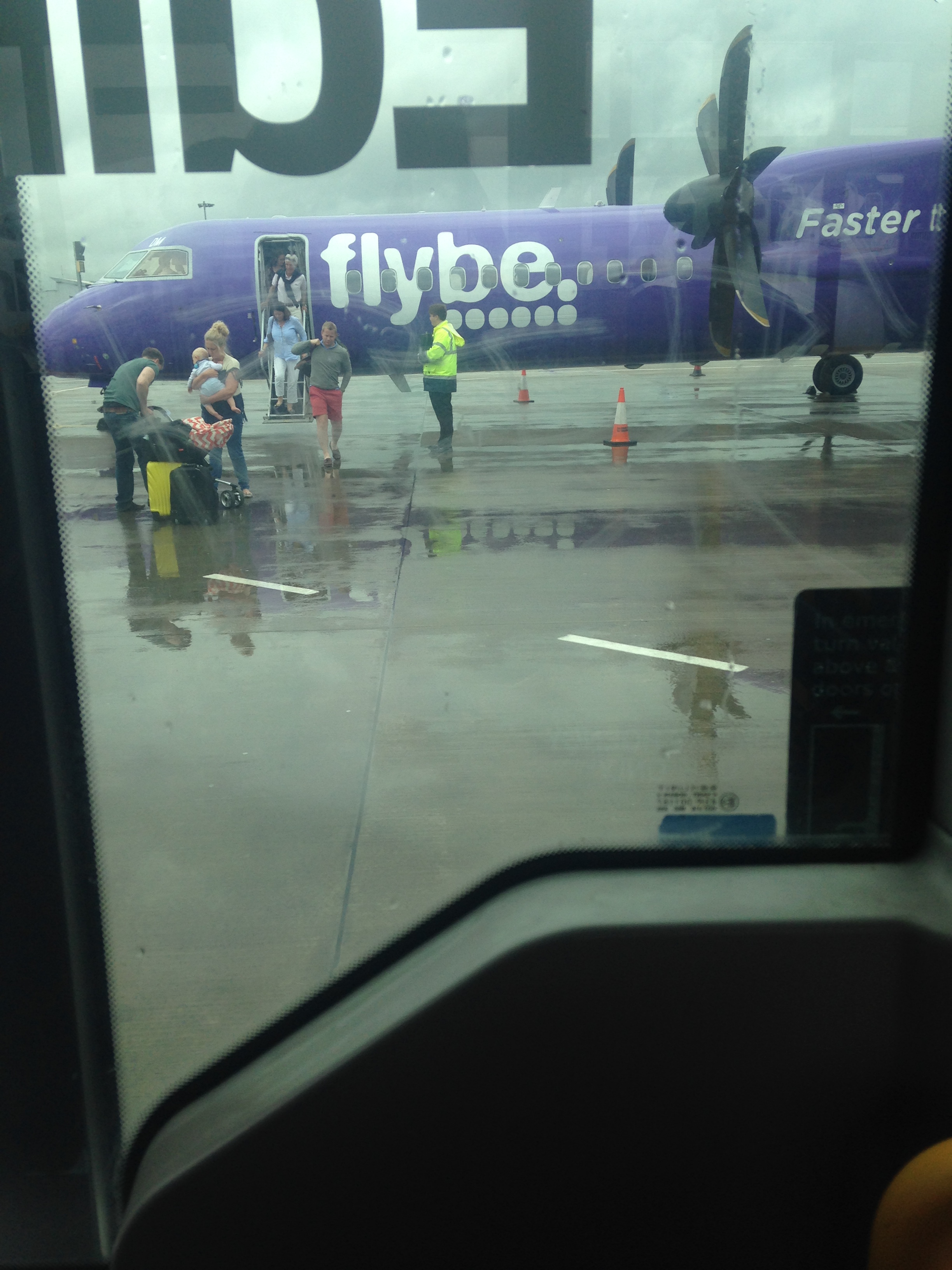 A photograph of a small blue airplane, which I lovingly refer to ask a "I'm going to die" plane.