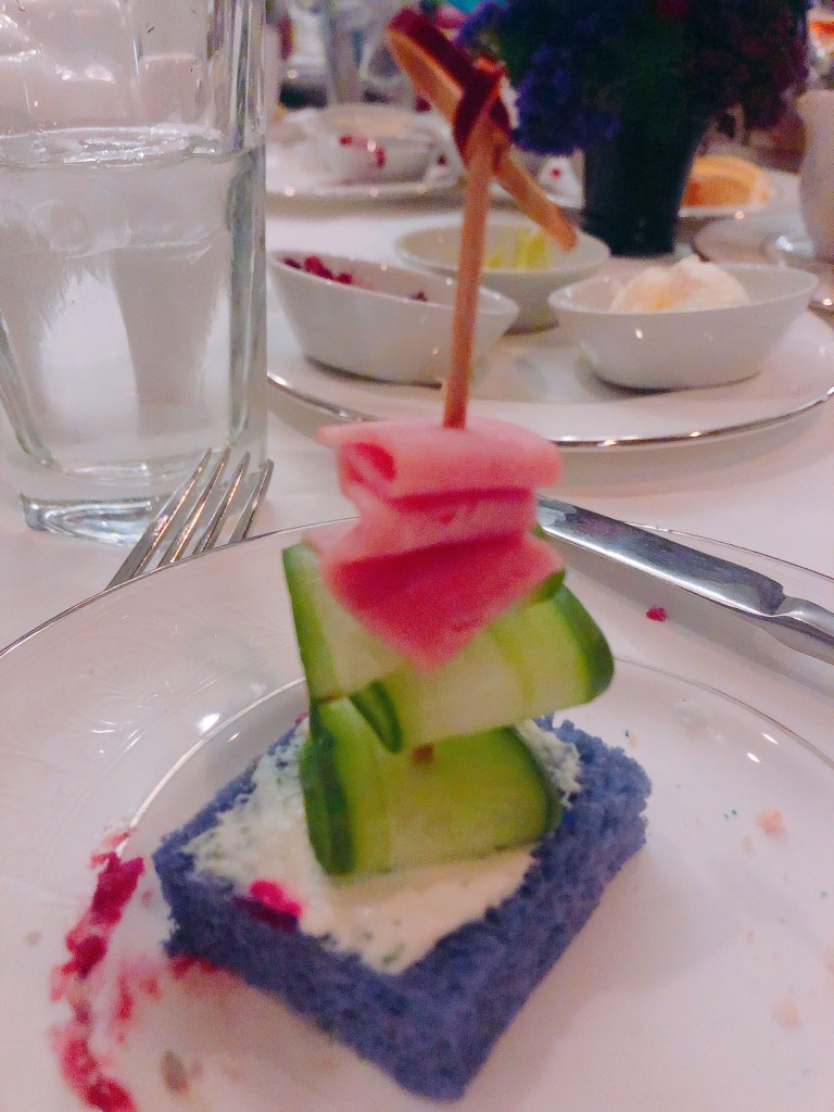 The last sandwich of the bunch. A simple sandwich of ham, cucumber and cream cheese. The ham and cucumber are folded accordion-style to represent the stretching room of the Haunted Mansion.